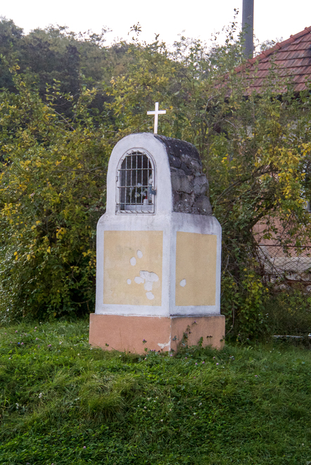 A wayside chapel in front of house no. 115 in the Nitra line, built in the second half of the 20th century instead of an older chapel