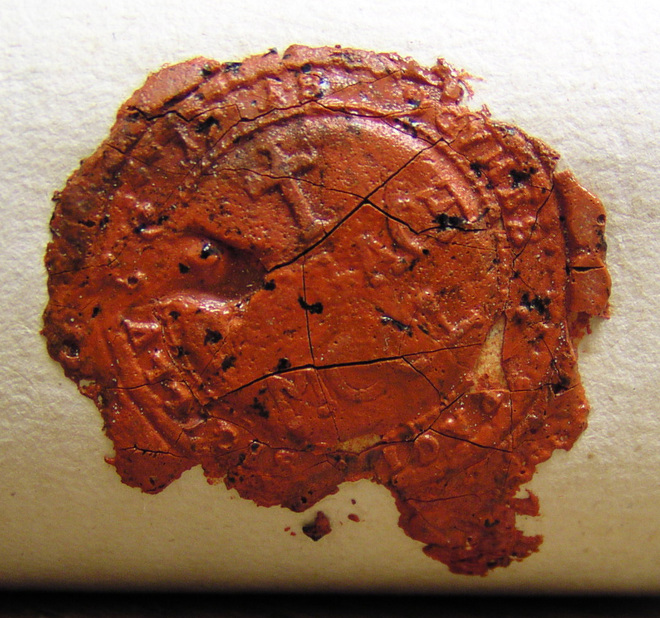  Impression of the municipal seal of Gymes on a deed from 1718. The inscription reads ‘GYMES * PAGI * SIGILLVM 1718’. Latin cross with the inscription FORGACH in the central field, the third line reads ‘MCCL’ (i.e. 1250)