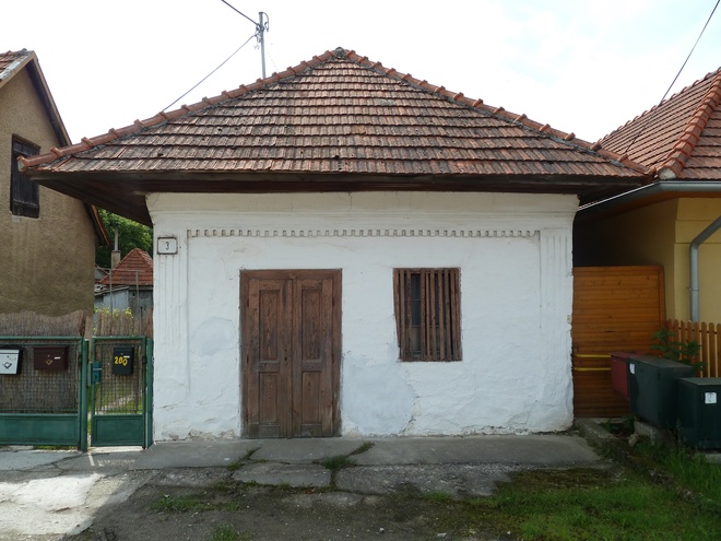 Kostoľany pod Tribečom No. 3 with atypical entrance from the street, former store on the southern end of Hlavna ulica (Main Street)